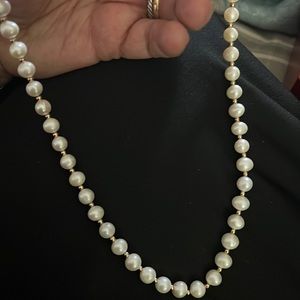White pearls with gold beads and lock